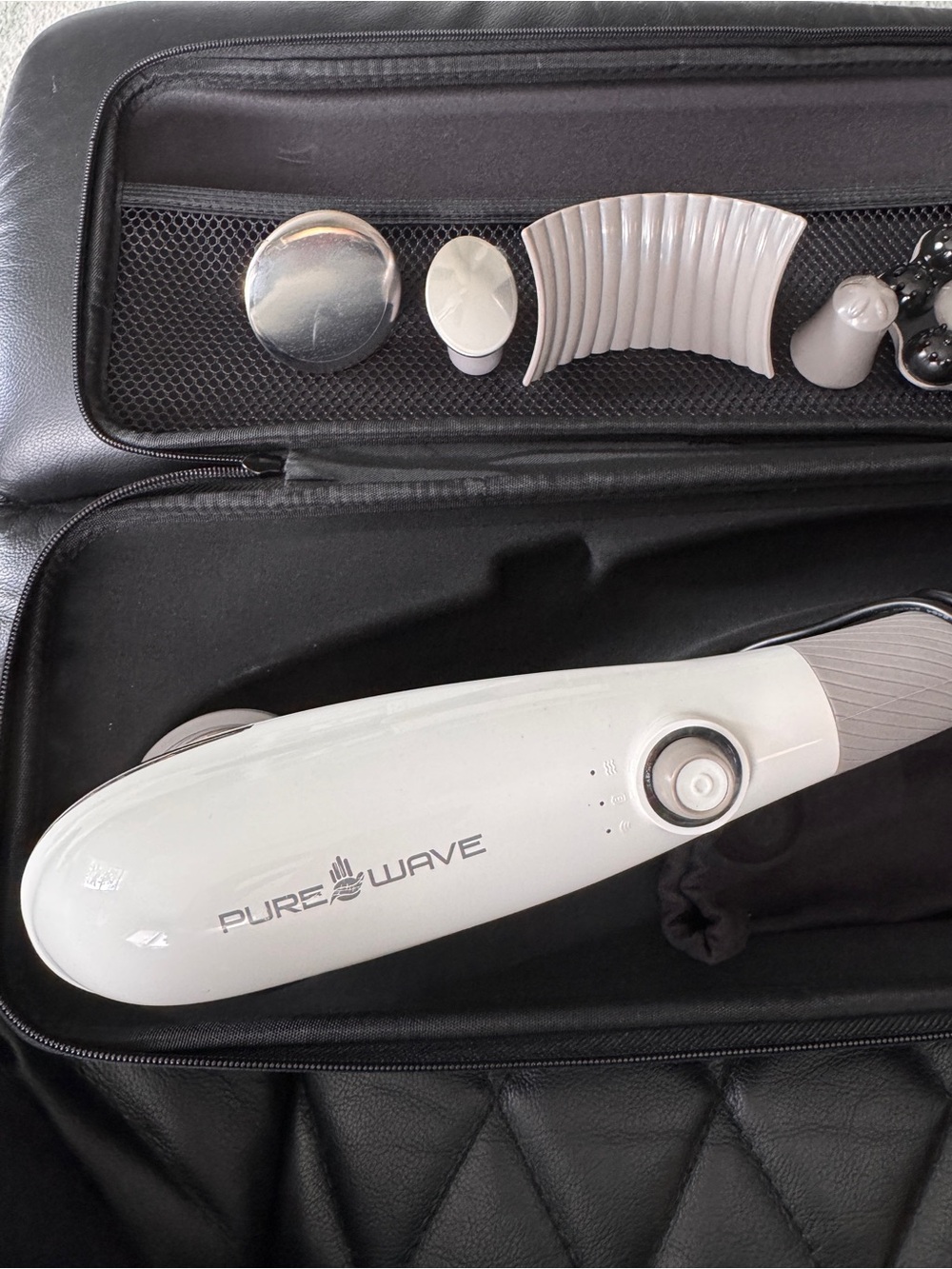 White Handheld Massager with Multiple Heads